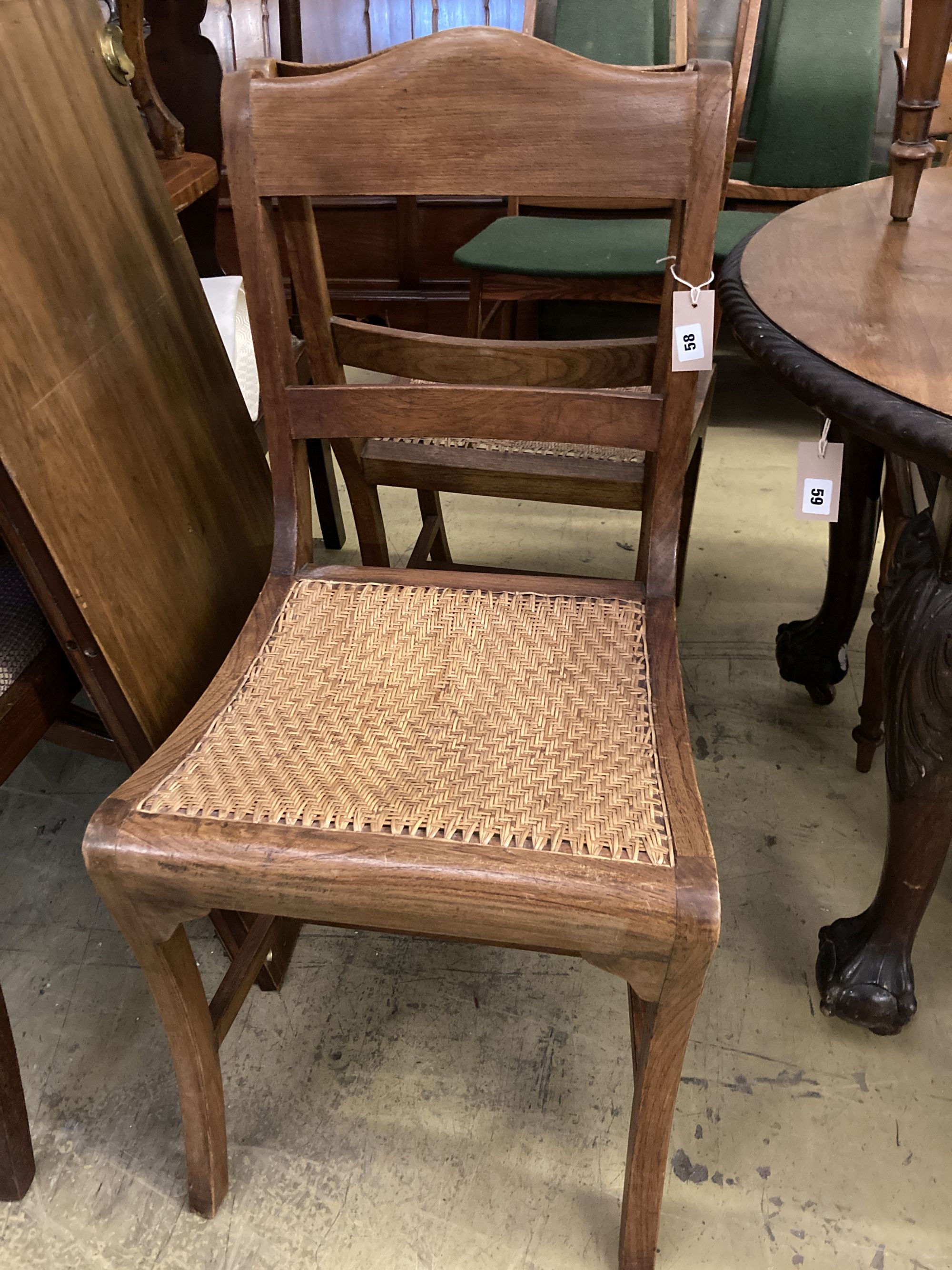 Six Anglo Indian caned hardwood dining chairs